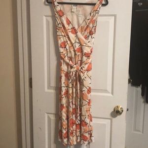 Wrap top flare dress.